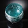 mermaid bowl by allister Malcolm. patterned glass with sterling silver leaf