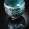 mermaid bowl by allister Malcolm. patterned glass with sterling silver leaf