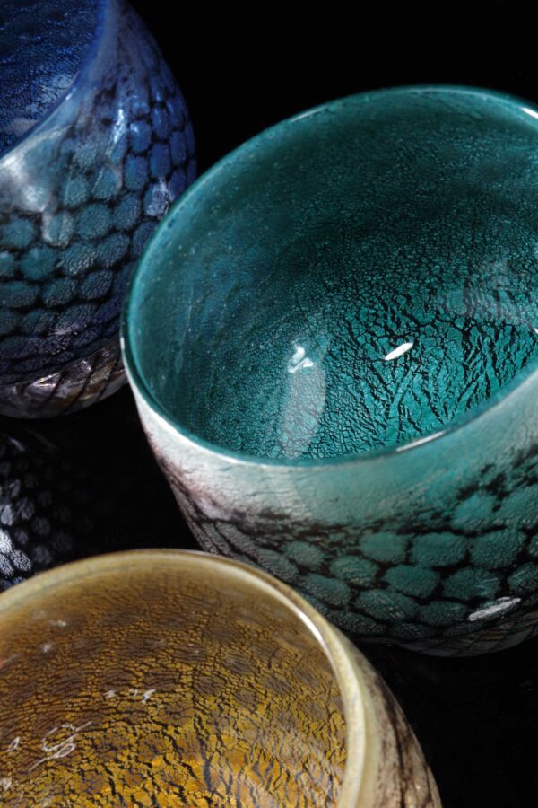 mermaid bowl by allister Malcolm. colourful patterned glass with sterling silver leaf
